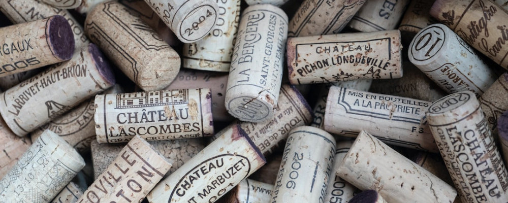 When are Bordeaux wines determined to be Grand Cru or Grand Cru Classe?