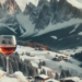 Wine retreats in the Alps - picture of a wine glass in front of mountains