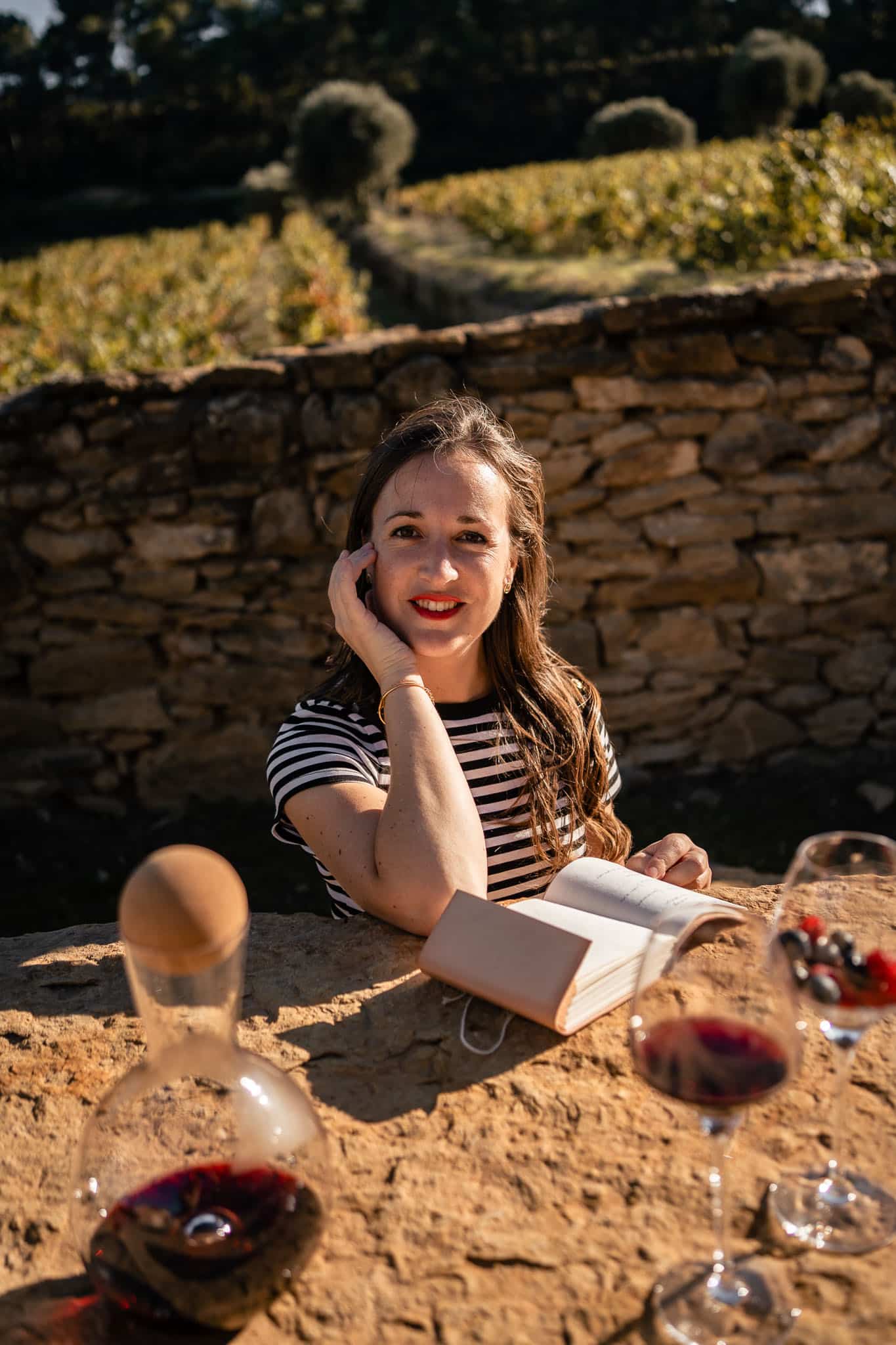 me sitting at a table with my a book