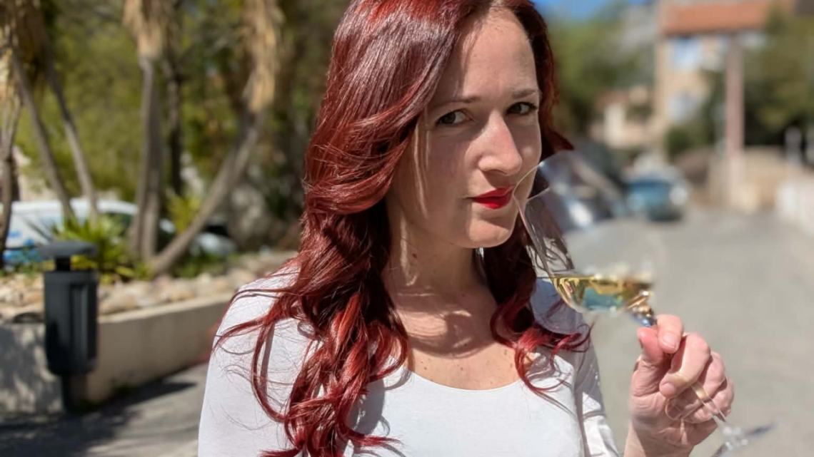 me with a white wine glass